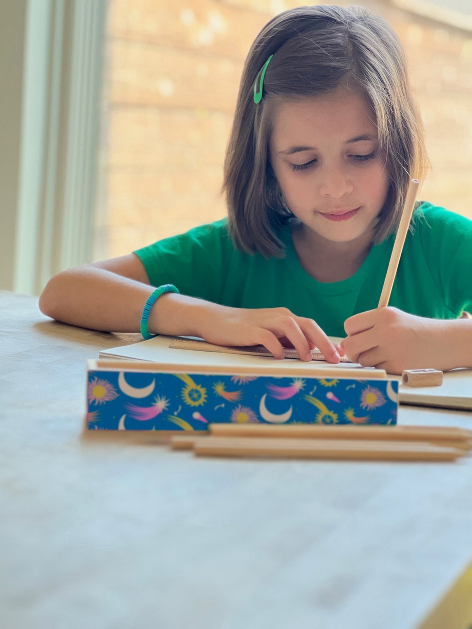 Cosmic Pencil Box (plus 12 colored pencils, sharpener, and ruler)